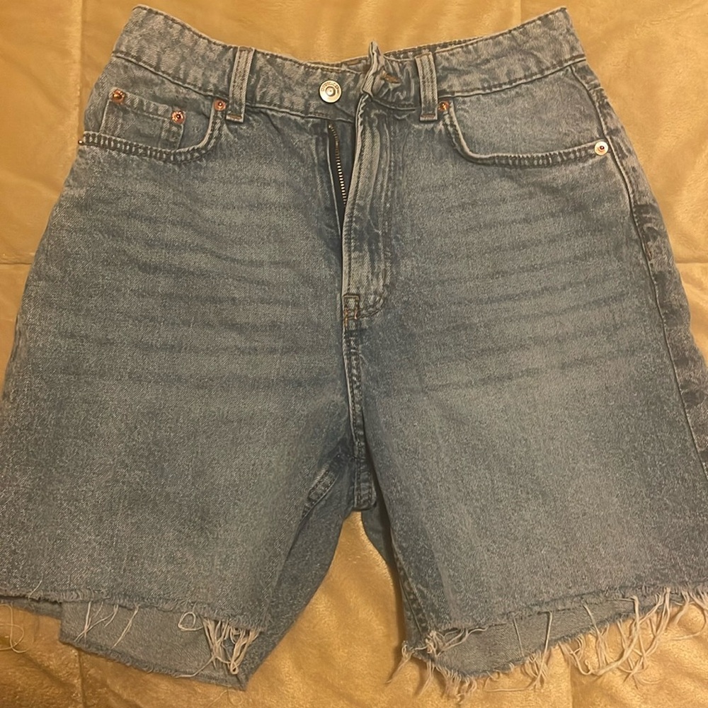Gently used denim shorts from H&M. Light blue denim cutoff shorts for teens.
